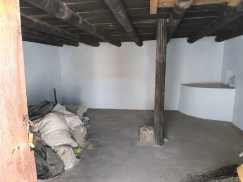 Terreno rústico en venta con cuarto y cueva en San Mateo