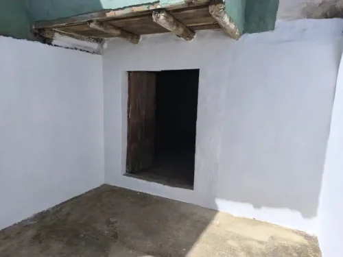 Terreno rústico en venta con cuarto y cueva en San Mateo
