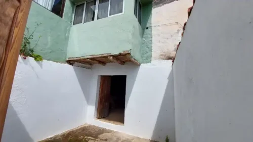 Terreno rústico en venta con cuarto y cueva en San Mateo