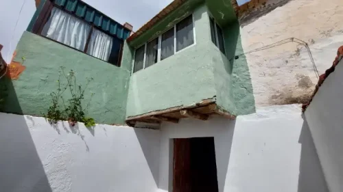 Terreno rústico en venta con cuarto y cueva en San Mateo